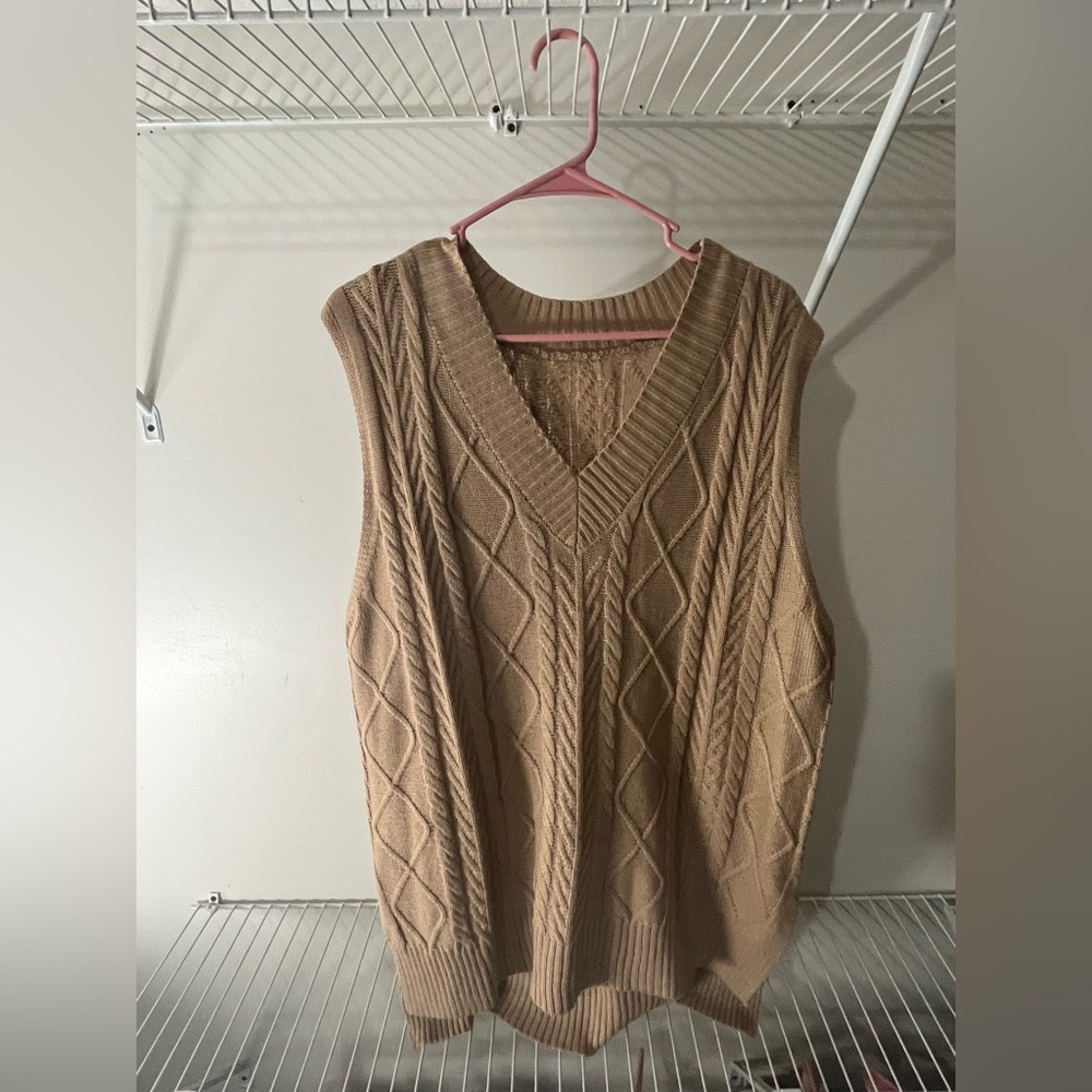 Very nice cream vest.